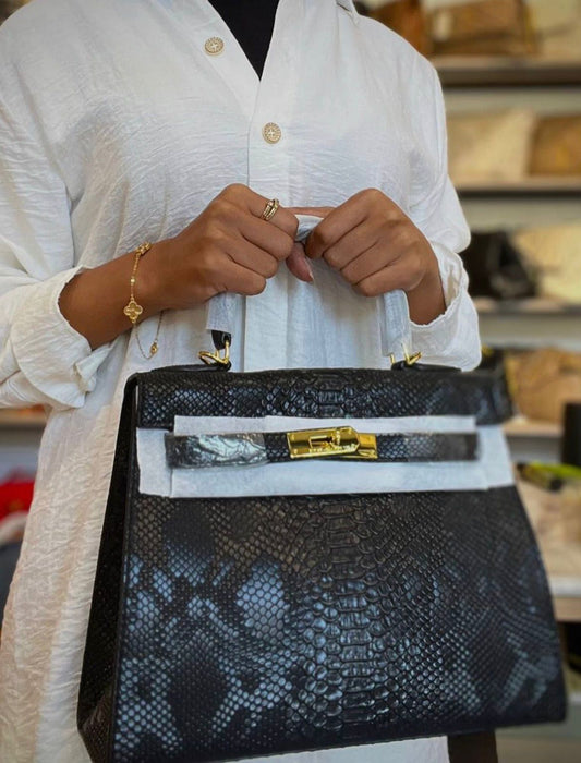 Hermès Kelly 28cm Crocodile Palladium Hardware