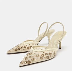 Imported Pointed Toe Brand Logo Heels