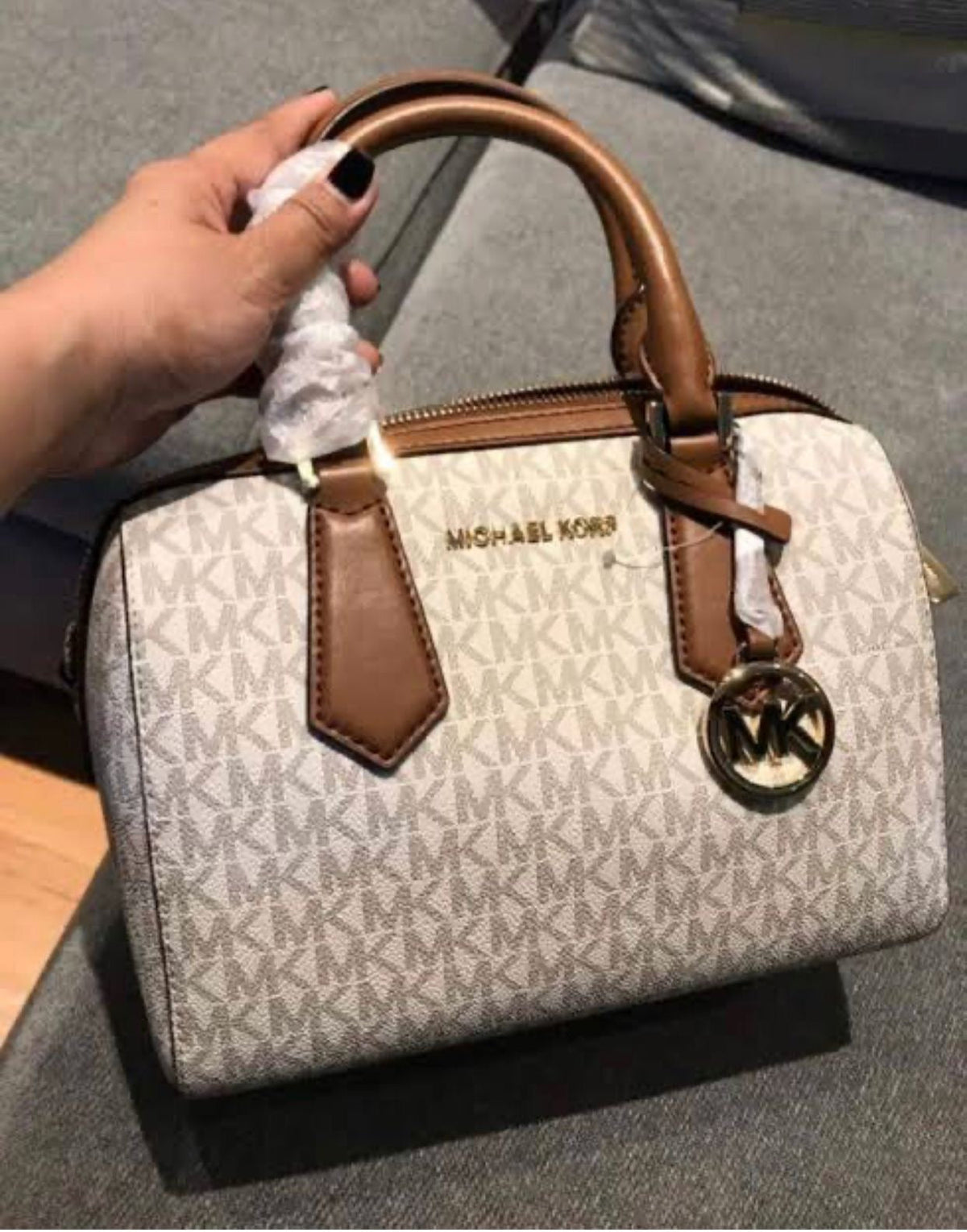 M K Sling Duffle Hand Bags