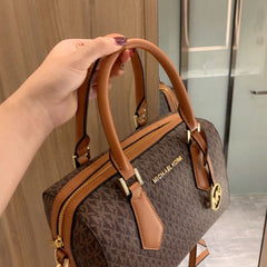 M K Sling Duffle Hand Bags